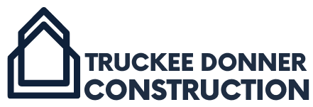 TDC-blue-logo Logo of Truckee Donner Construction featuring a stylized house icon on the left and the company name in bold, dark letters on the right.